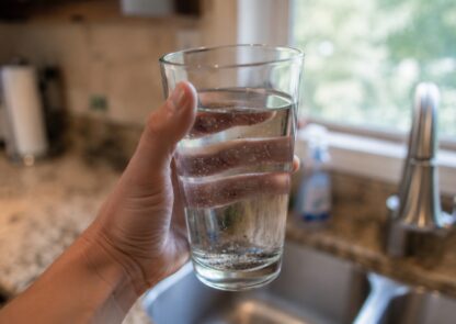 what causes black particles in well water